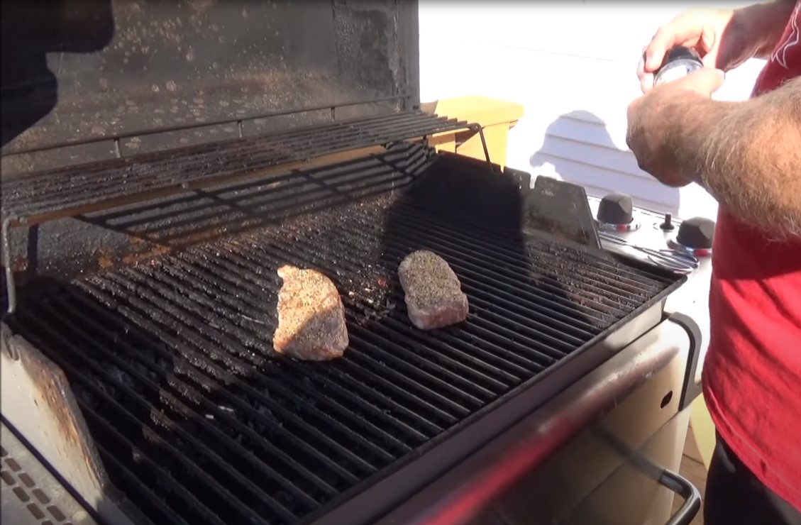 cooking frozen steak on grill